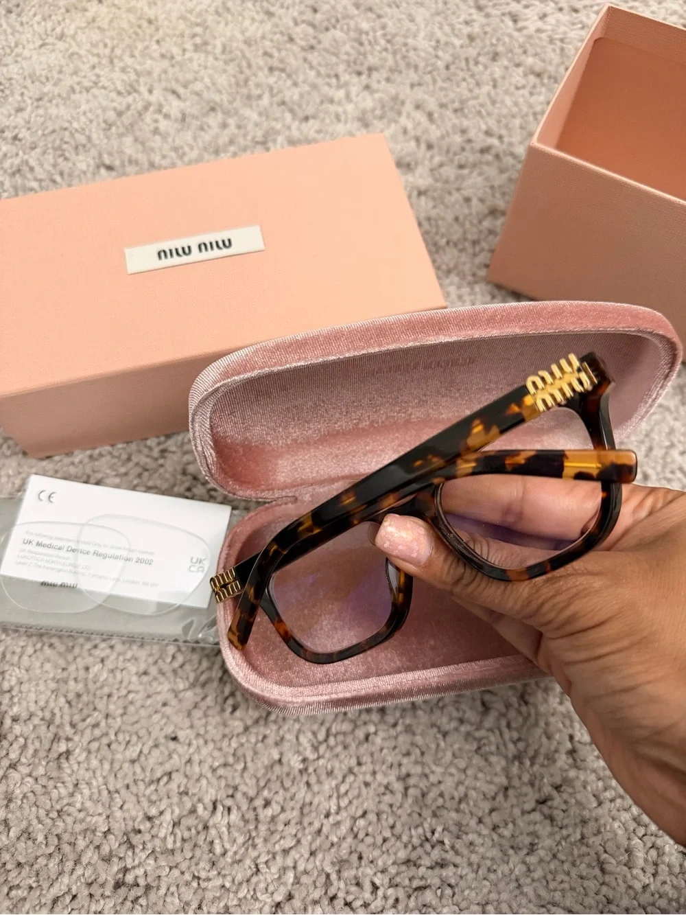 Miu Miu Tortoiseshell Frame Glasses with Gold Accents